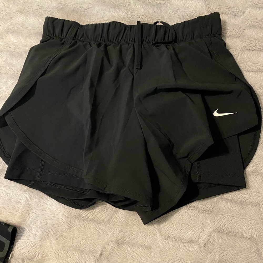 NIKE- womens running shorts (size small)